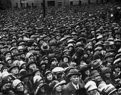 A crowd of people wearing hats.