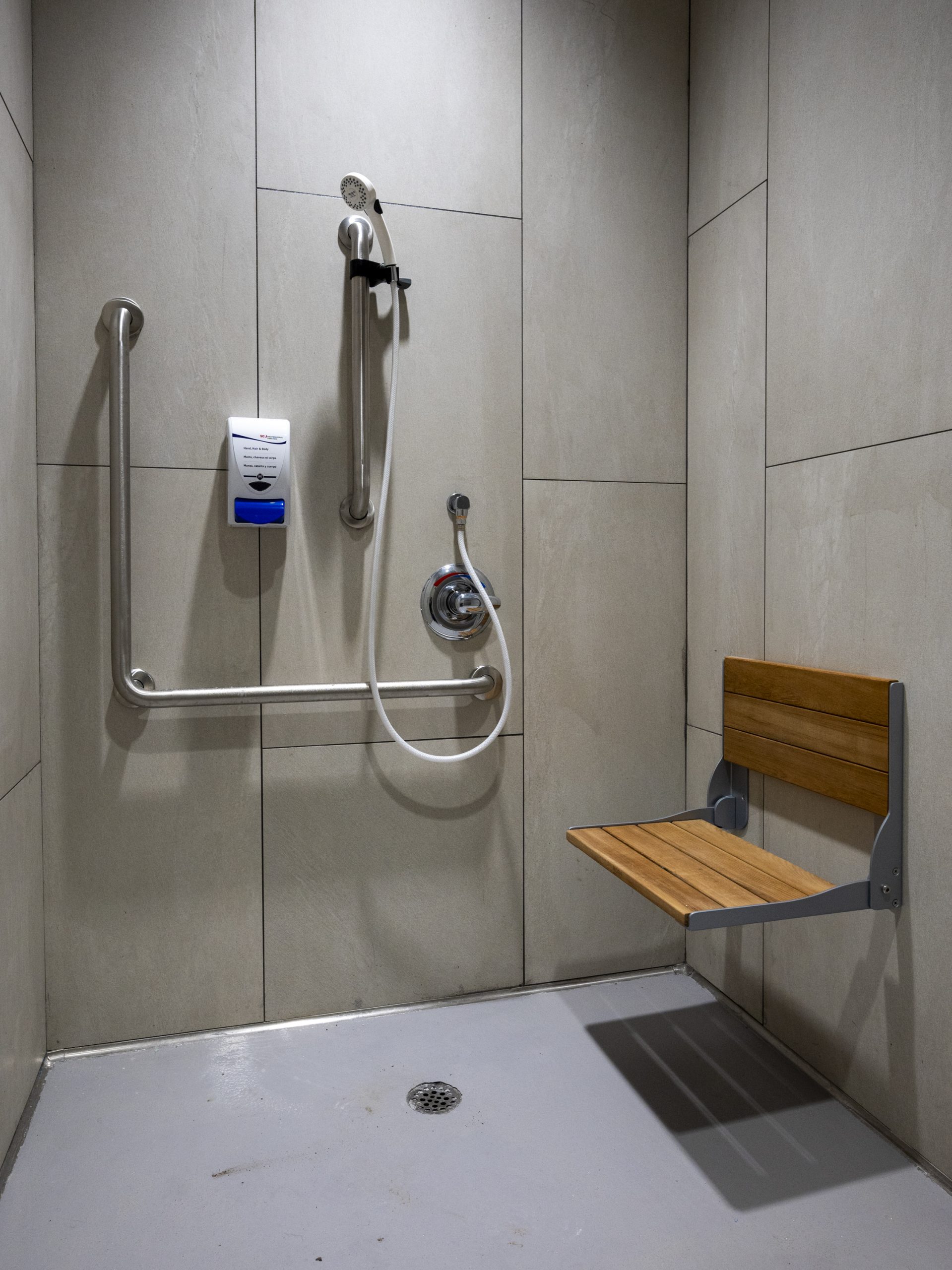accessible shower with wall bench