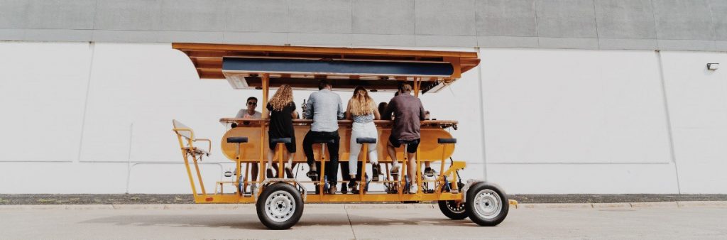 Image of a pedal bar with people sitting