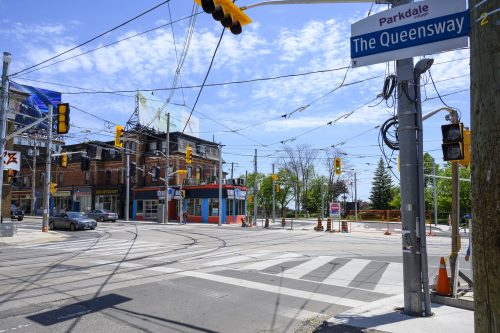 Images of construction at 416-392-0472 or kqqr@toronto.ca the King Queen Queensway Roncesvalles intersection. For more information please contact Michael Vieira at 416 392 0472 or kqqr@toronto.ca