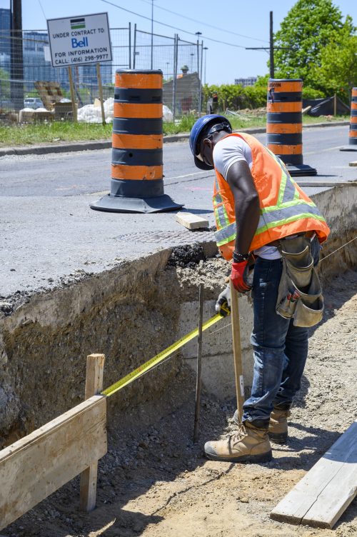 Images of construction at 416-392-0472 or kqqr@toronto.ca the King Queen Queensway Roncesvalles intersection. For more information please contact Michael Vieira at 416 392 0472 or kqqr@toronto.ca