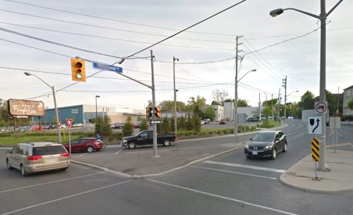 Before the right turn channel removal at Millwood Rd and Laird Dr