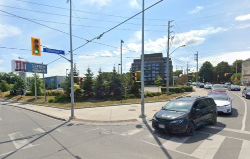 Right turn channel removal at Millwood Rd and Laird Dr