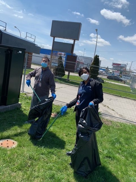 Image of staff from the 1677 Wilson Avenue shelter participating in a community clean-up event