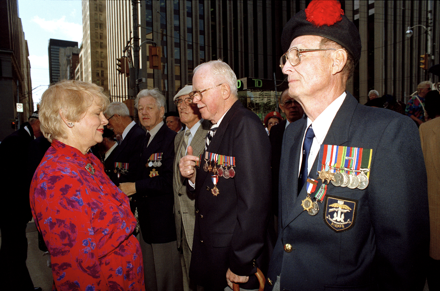 Former Mayor June Rowlands speaks with veterans at the "Fifty Years Since Dieppe" ceremony. Credit: City of Toronto.