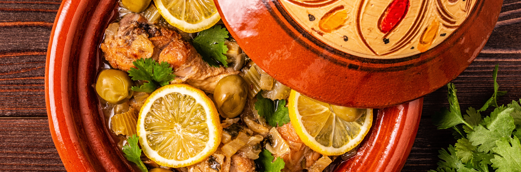 Tagine dish in red decorative bowl