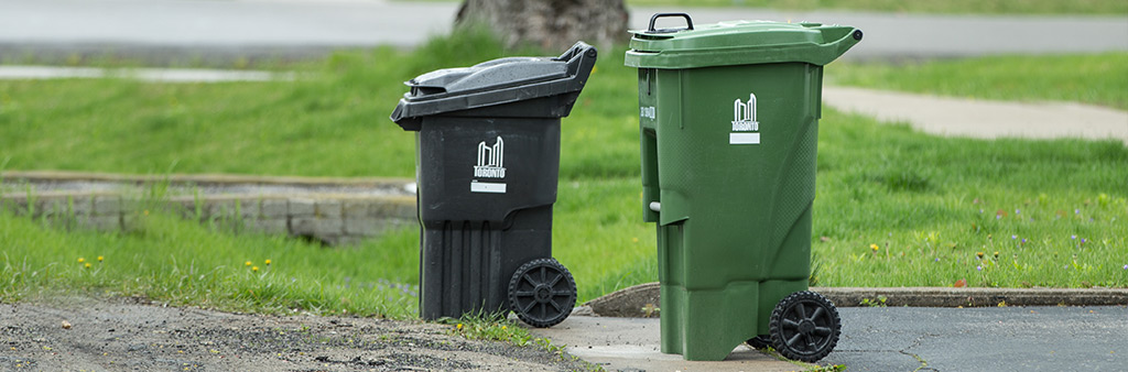 City of Toronto's green and black garbage bins
