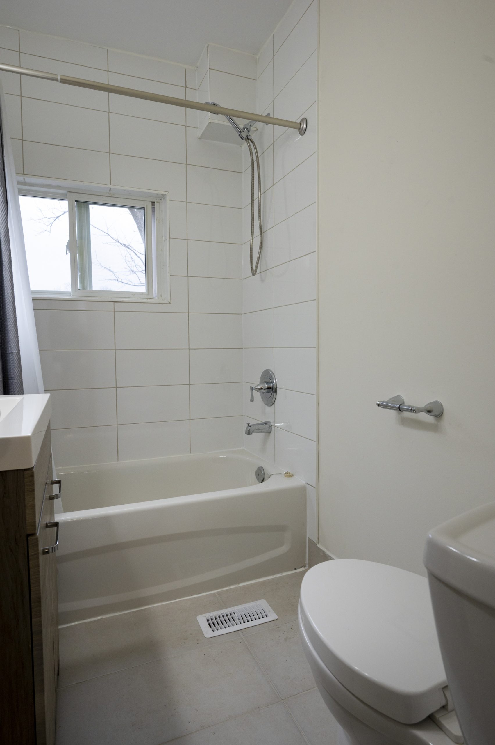 Renovated bathroom with tub