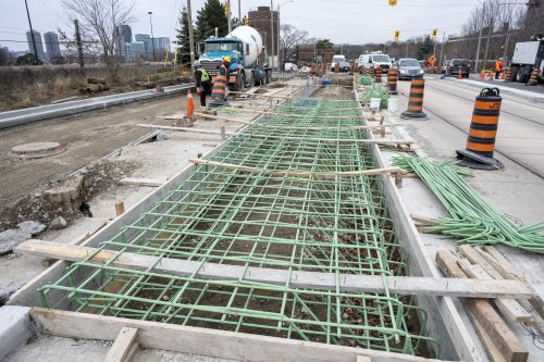 Images of construction at the King Queen Queensway Roncesvalles intersection. For more information please contact Mark De Miglio at 416 392 0472 or kqqr@toronto.ca