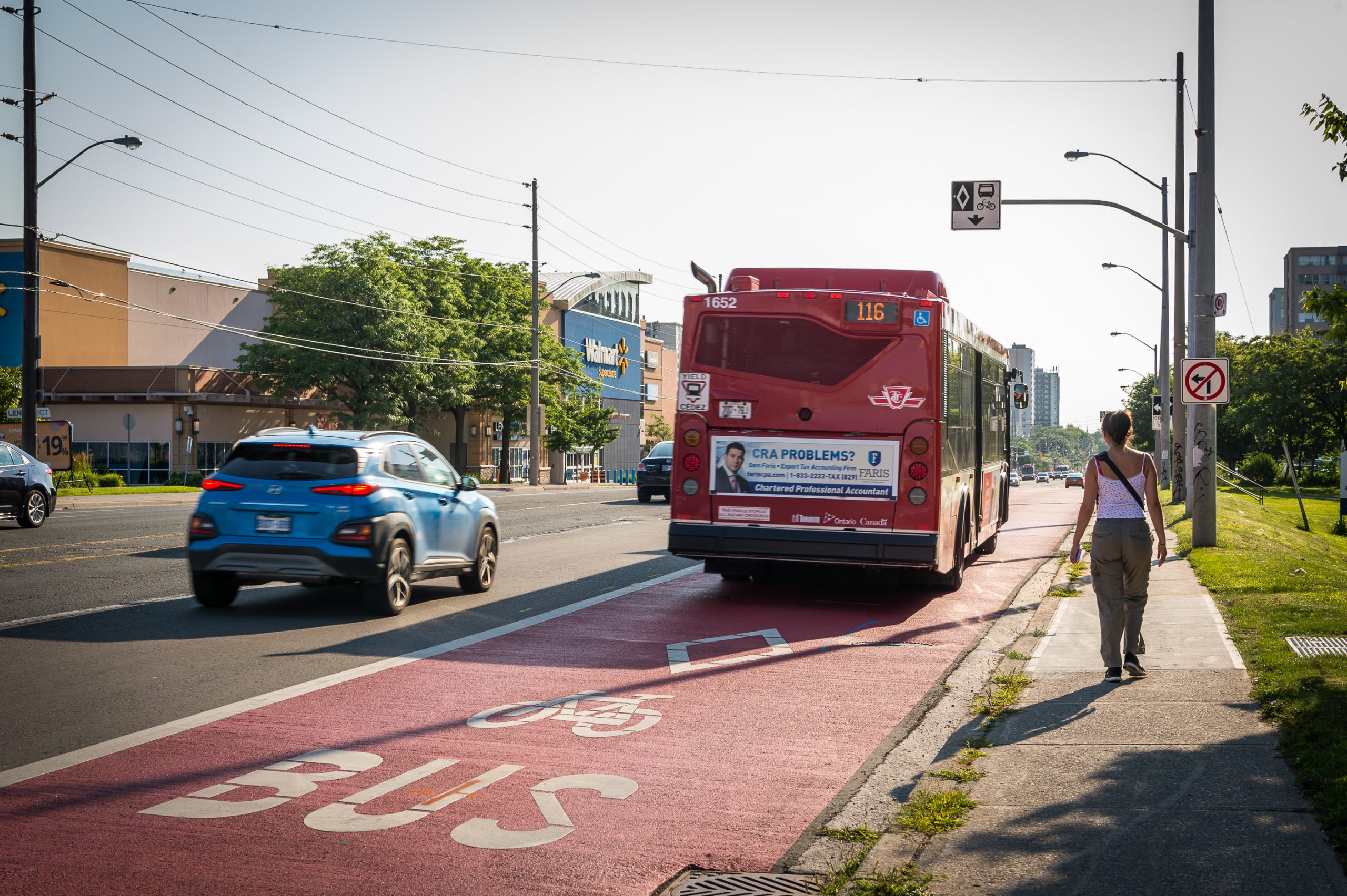 A bus using a priority bus lane on Eglinton Avenue East.