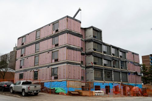 Image of modules being craned into place at the craning event for 39 Dundalk Dr. on January 20, 2022.