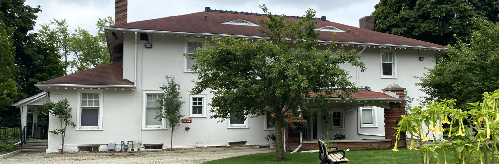 Exterior of Cedar Ridge main building in summer