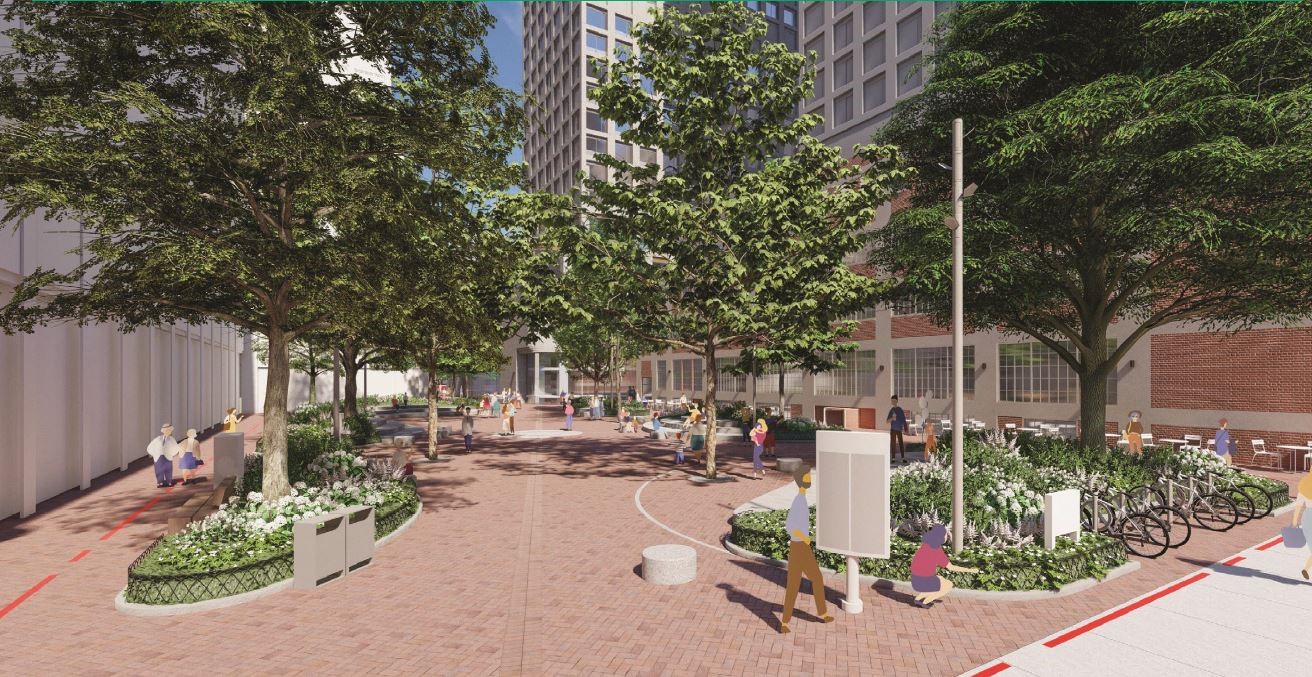 A rendering of the proposed design for the new park on Richmond Street. The view is into the park from Richmond, towards the west entrance to the park. At the entrance to the park there is a set of garbage and recycling bins on the left and a community notice board on the right. Near the entrance is a small circular seating features. There is bike parking along the sidewalk on the right side of the image. The centre of the park is open space for gathering. Along the outside of the park are semi and half circle planting beds with trees and plantings. On the inside of each planting bed is tiered stone seating, facing into the park. There are walking pathways along all side of the park, between the park and neighbouring buildings. There are light posts with multiple light bulbs attached to the side of the posts near the top, pointing down.