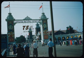 Photograph depicts CNE entrance with coronation decorations