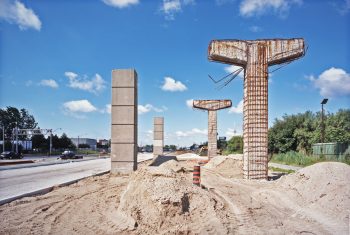 Image depicts demolition of concrete structure