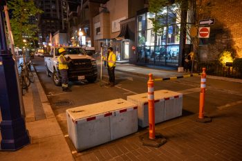 Concrete blocks and bollards on city street