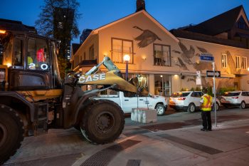 Bylaw officer oversees installation of concete block