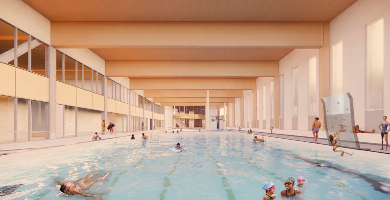A rendering of the proposed design for the aquatic wing, with a viewpoint from the north end of the pools looking south towards the Lobby. The lane pool, with a play climbing wall on the right side. Windows on the right look out onto Sorauren Park. In the background is the Leisure pool, with a tri-bucket dump water play structure. There is a large, two storey glass wall between the lobby and the aquatic wing.