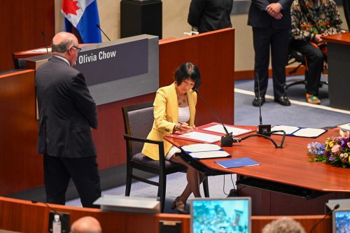 Mayor Olivia Chow officially signing.