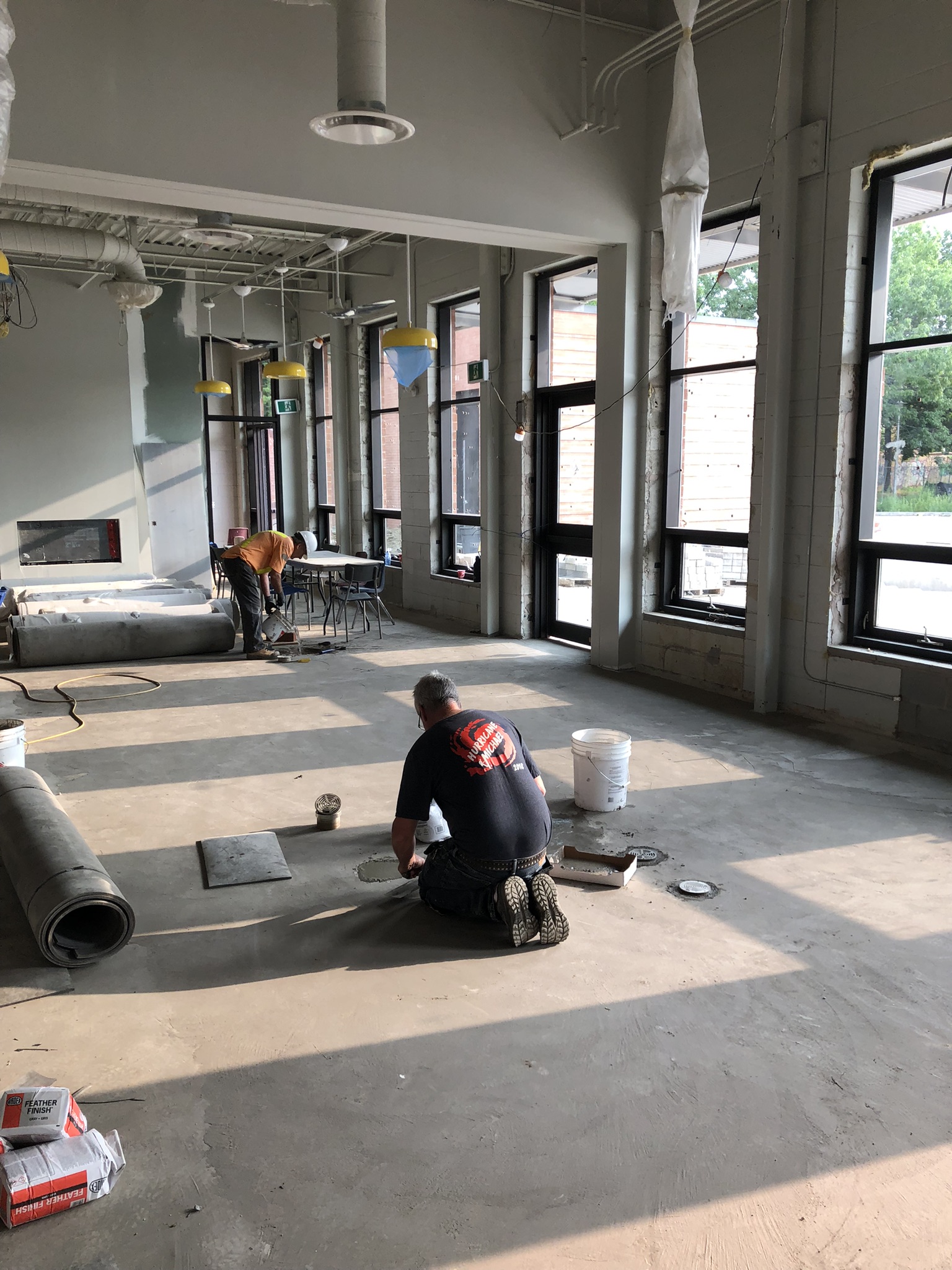 View within Clubhouse looking north within Multi-Purpose Room, with new window installation visible along the right side of the image.