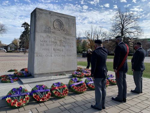 3 members of the Royal Canadian Legion laying wreaths at the East York Civic Centre cenotaph on November 11, 2022