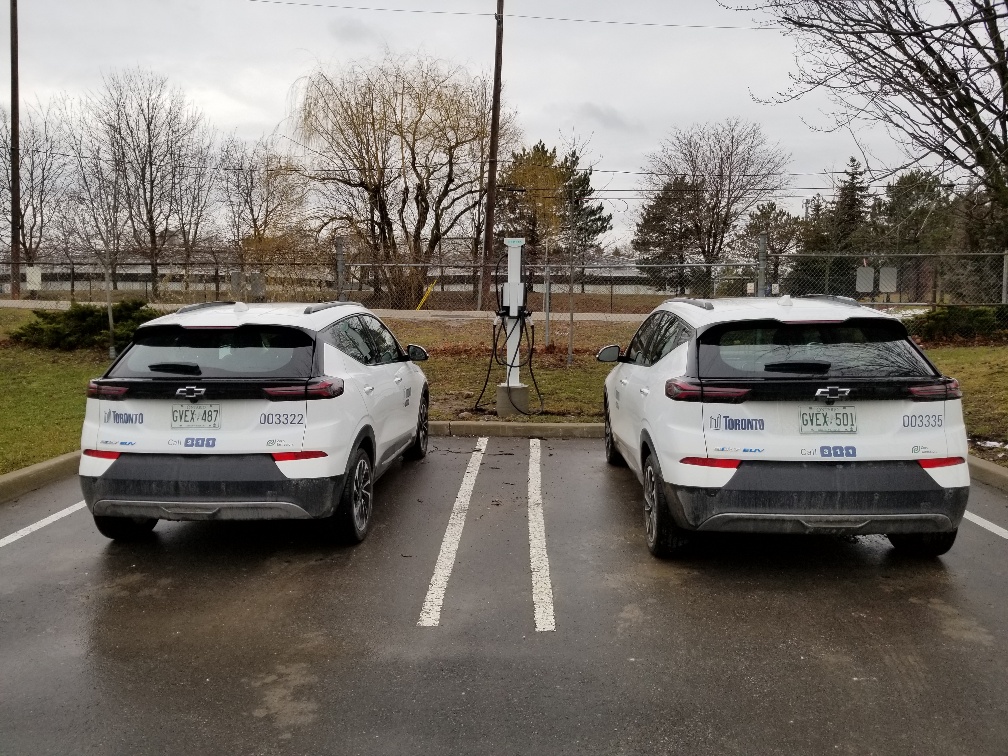 Cars parked near EV chargers.