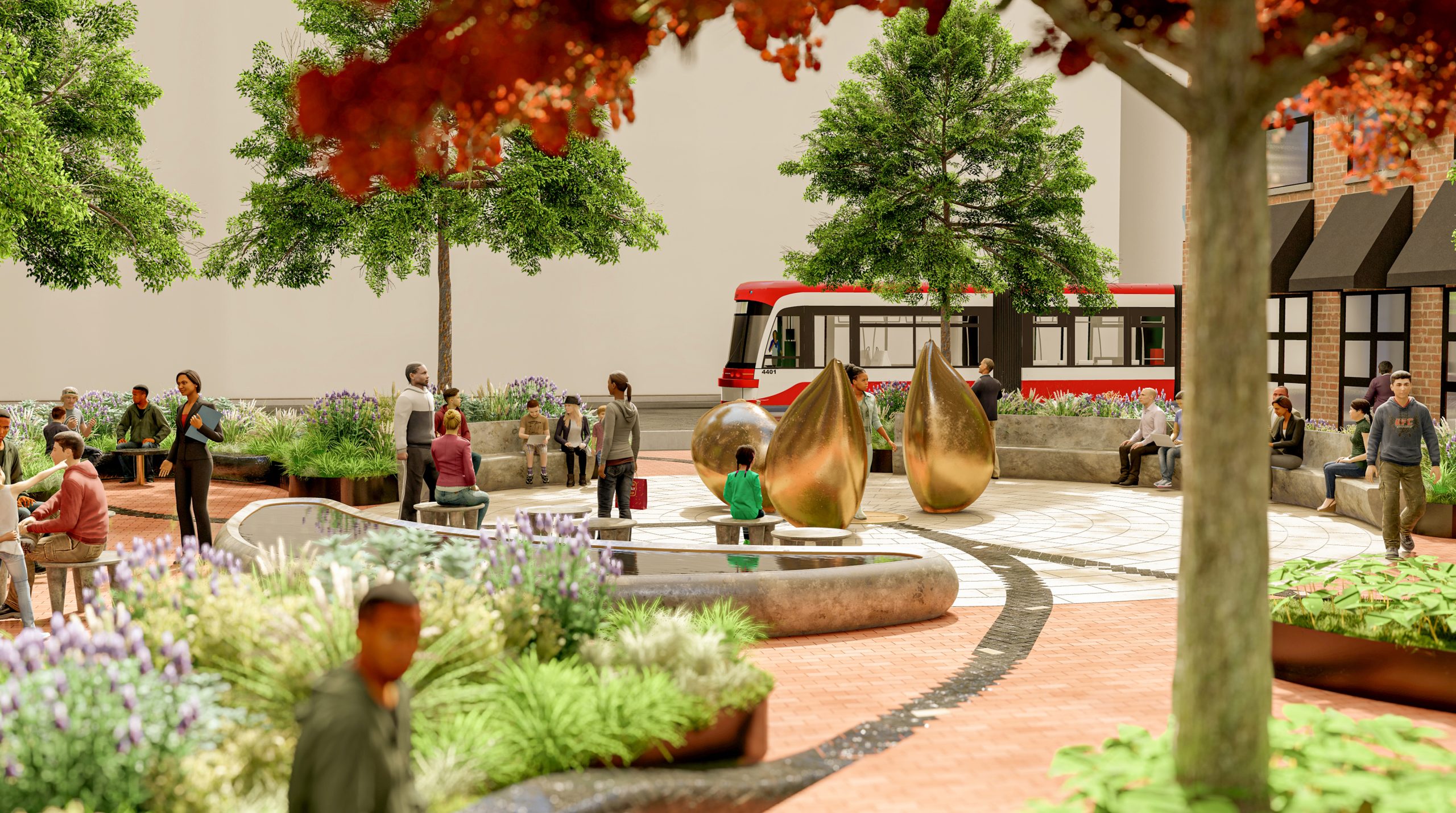 A view from the northeast corner of the park, looking south towards the water feature. In the foreground, a person sits on a granite bench surround by native tree and perennial plantings in a raised planting bed. Behind the plantings is the calabash-shaped water feature. People sit and stools and stand around the water feature, in front of the three Cowrie sculptures. The King streetcar can be seen driving by in the distance. On the far southwest side of the park, people sit on a long linear bench in front of the existing brick heritage private building that borders the park. 