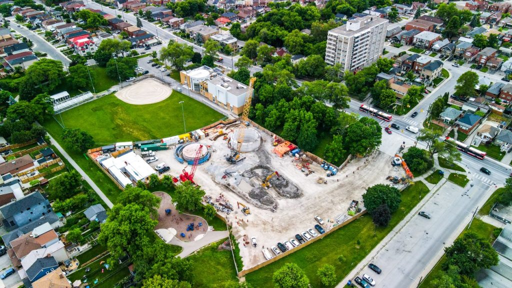 Photo of the newly constructed circular shaft surrounded by construction equipment at Fairbank Memorial Park