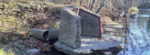 Photo of damaged storm sewer outfall in Mimico Creek.