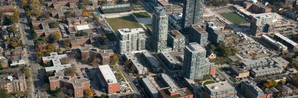 Arial view of high rise buildings and parks in the neighbourhoods located in the Downtown East.
