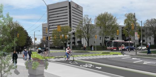 Rendering of planned improvements at Deauville Lane and St. Dennis Drive. The right-turn lane will be replaced with corner safety islands to slow turning vehicles and separate motor vehicles from people on foot and bike. People walking and cycling will have shorter distances to cross the street.