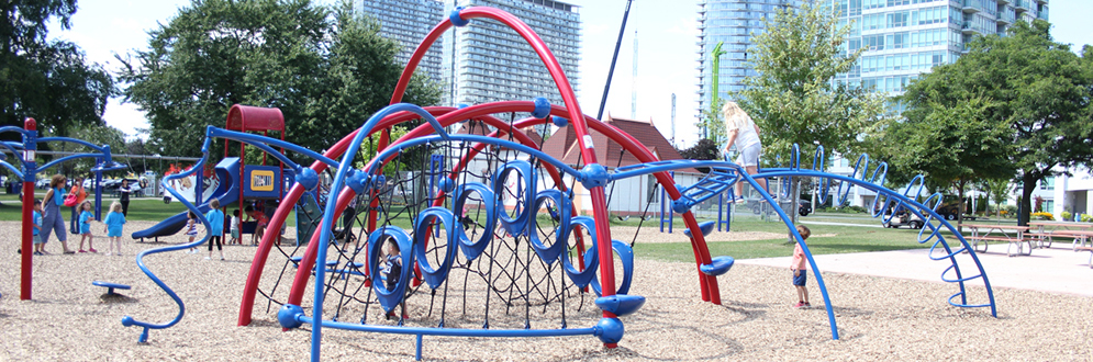 Children are playing at the outdoor playground.