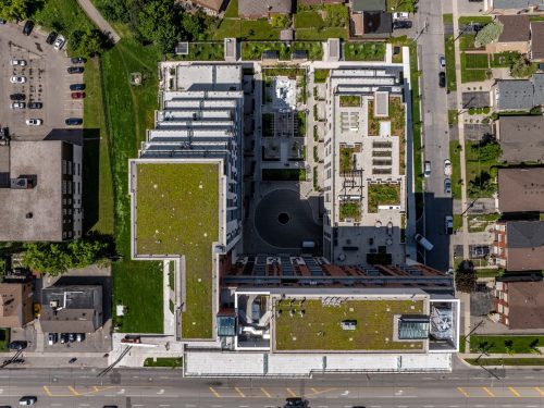Aerial view of 3100 Keele Street, 363-unit condo, a collection of individual homes stacked vertically – a neighborhood connected by hallways instead of streets.