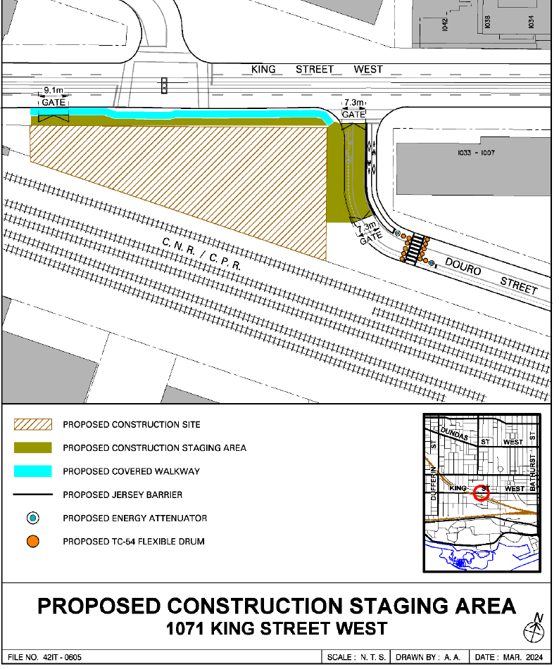 the image shows the temporary relocation of the bi-directional cycle track, as part of construction staging for 1071 King Street West 