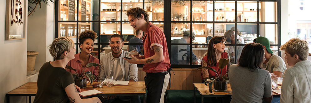 Server in a busy restaurant