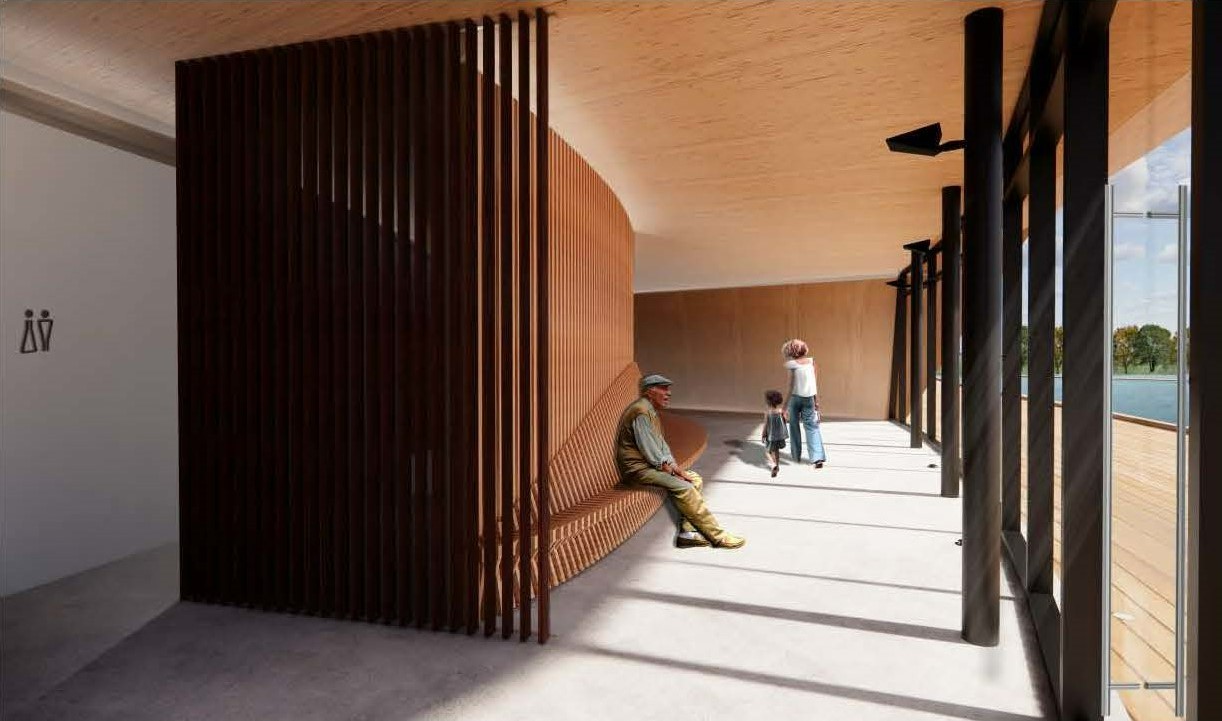 Rendering of the passageway within seating area in the recreation building. To the left is a curved bench made of narrow wooden strips that connects to a wall with the same design. To the right are floor-to-ceiling windows that overlook a terrace and pond. On the far left, behind the curved bench and wall, are washrooms and a narrow corridor.