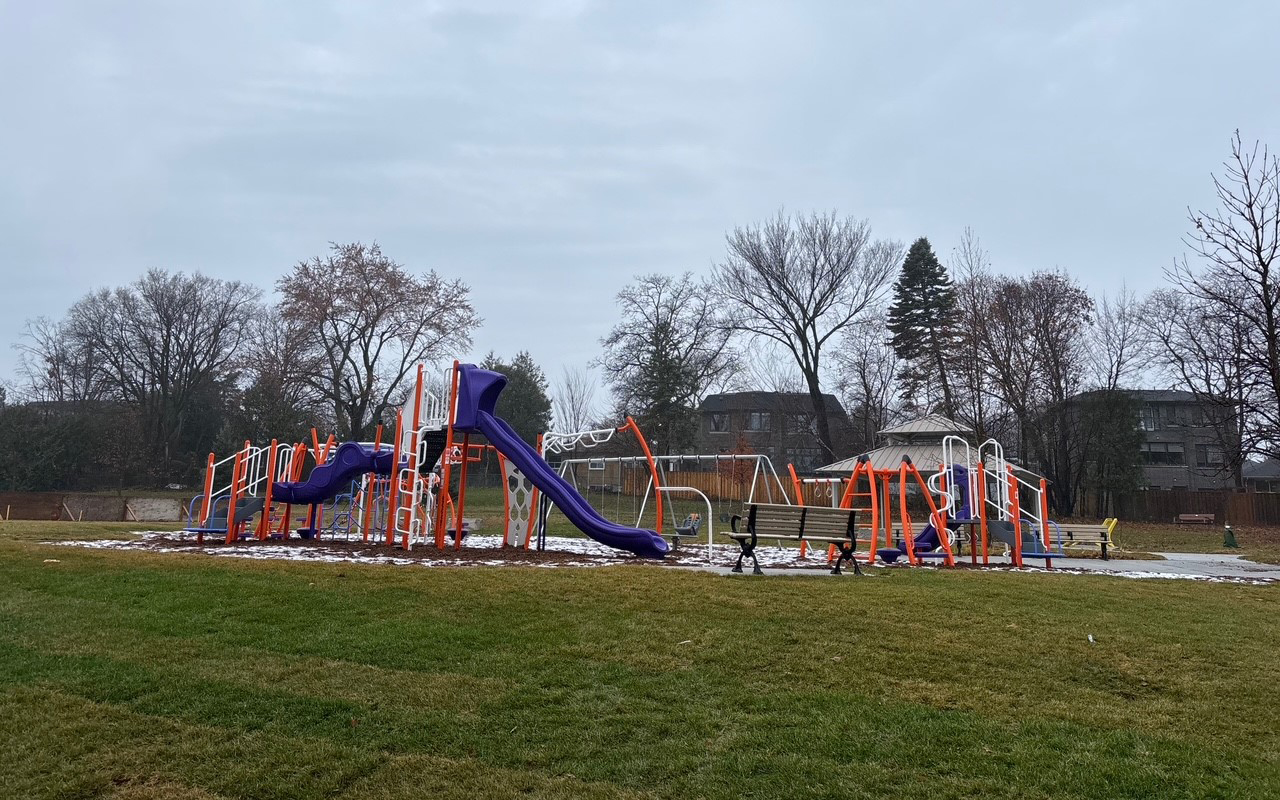 An orange, white, and purple play structure.