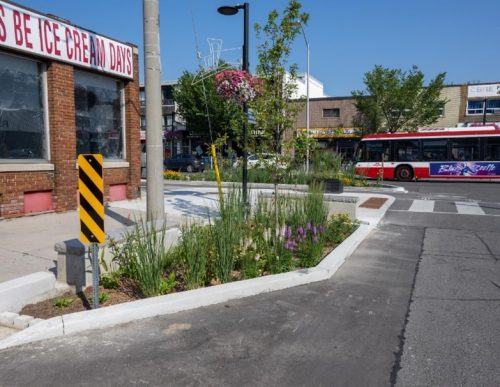 Image of green infrastructure integrated into a curb extension