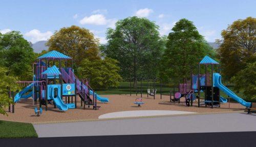 A ground-level view of playground option A, viewed from the existing path, showing from left to right, a spring rider toy, a senior play structure with multiple climbing options and slides, a standalone spinner toy, a junior play structure, and swings.