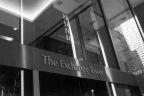 A up close shot of the front of the exchange tower building .