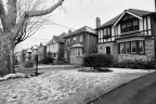 A row of houses on a street.