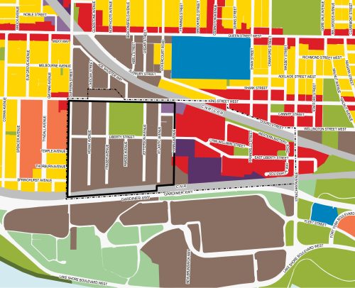The map is a color-coded land use map of Liberty Village in Toronto, showing different land use designations as defined in the City's Official Plan. West of Hanna Avenue, the area is designated Regeneration Areas in brown. East of Hanna Avenue, the area is designated Mixed Use Areas in red. A black border surrounds the Regeneration Areas as that is the focus of this new planning study within Liberty Village.