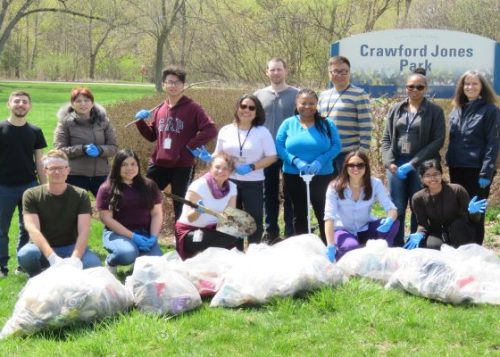 A group of volunteers at an annual spring cleanup in Crawford Park.