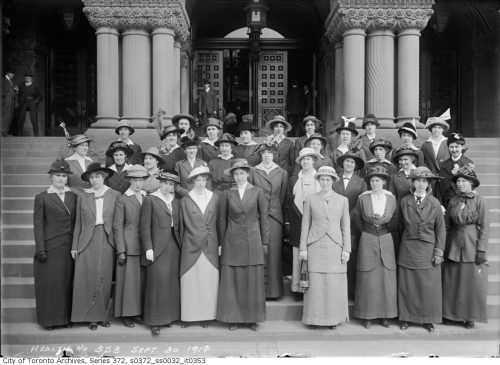 Group of female nurses standing on steps