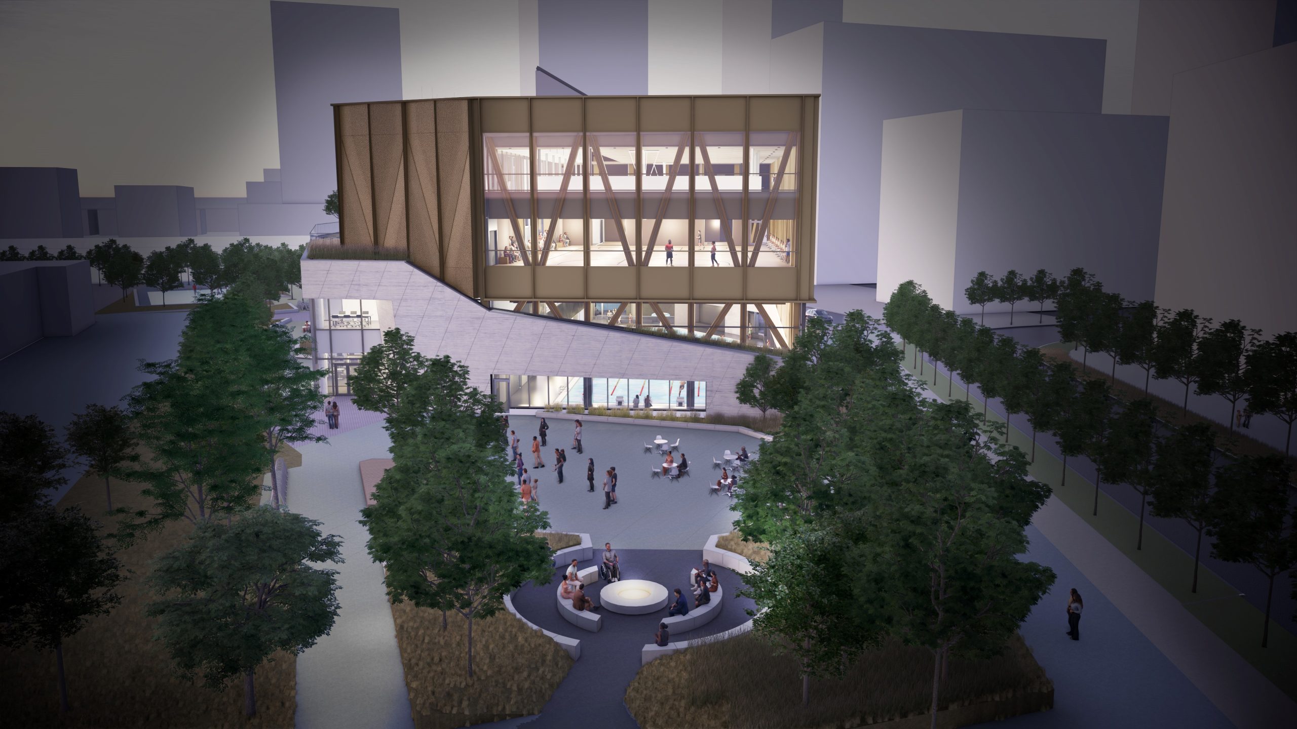 Exterior view of the new Lawrence Heights Community recreation Centre from the east, showing the community plaza and ceremonial fire pit.