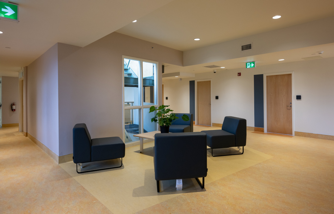 A gathering space with four comfortable chairs at 25 Canterbury Place.
