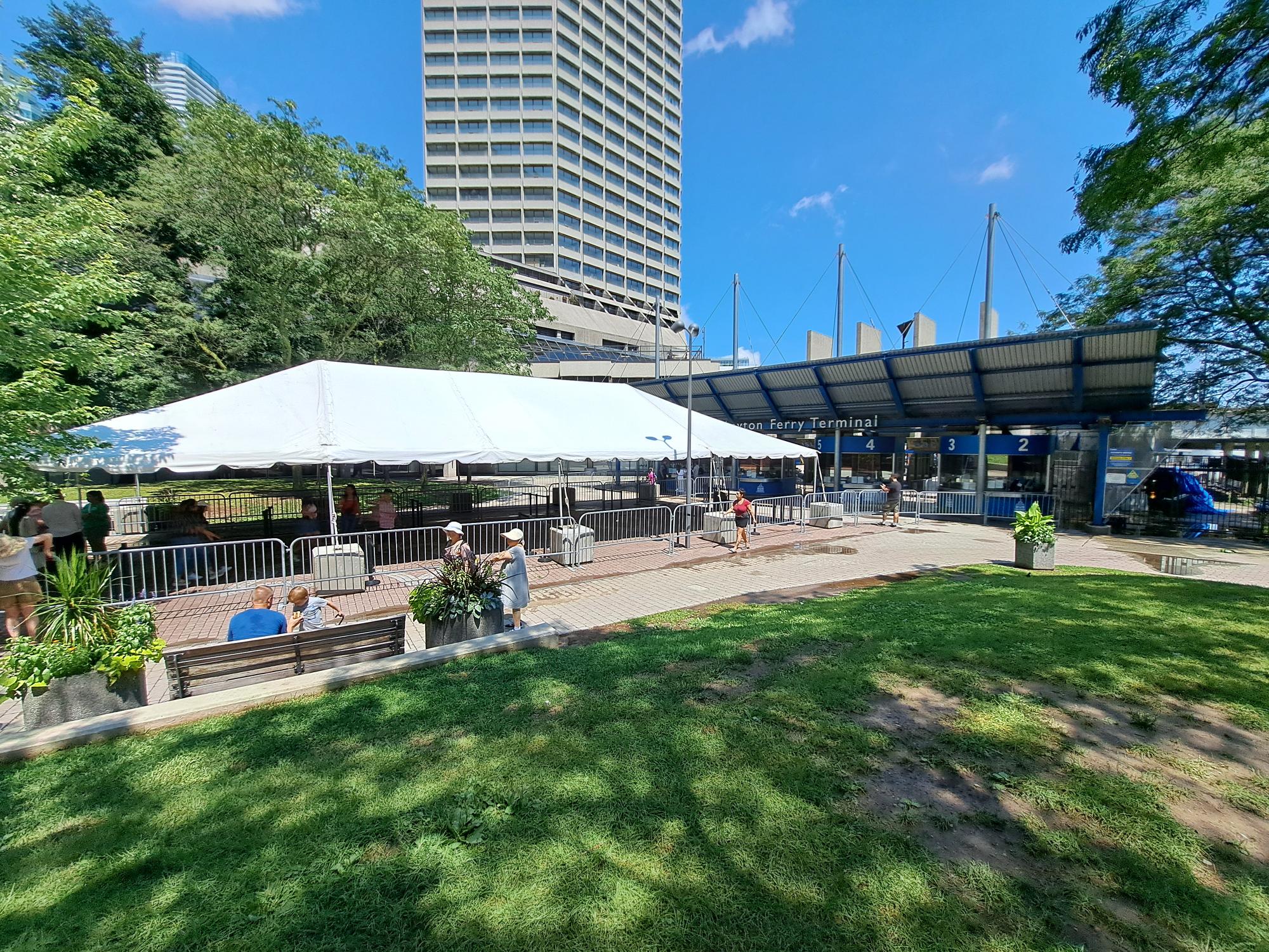 The area in front of the ticket booths at Jack Layton Ferry Terminal is covered by a large white tent during the summer months.
