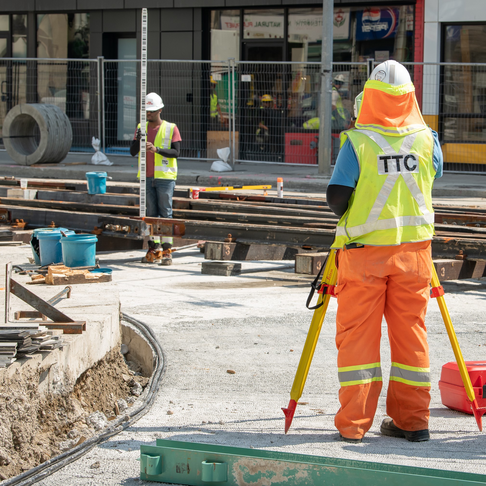 TTC crew measures for new streetcar track.