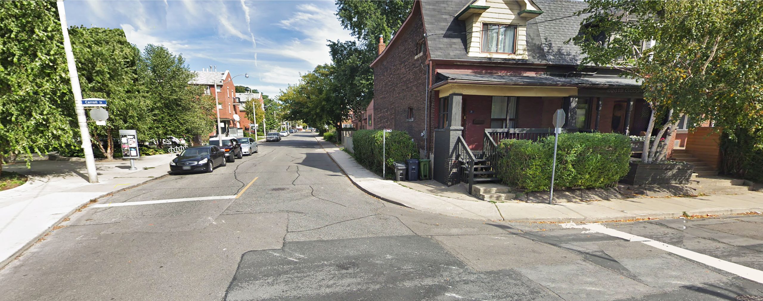 Photograph of Thompson Street at Carroll Street, looking east