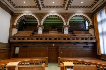 A view of the Old City Hall Council Chamber when looking at the guest seating from the front.